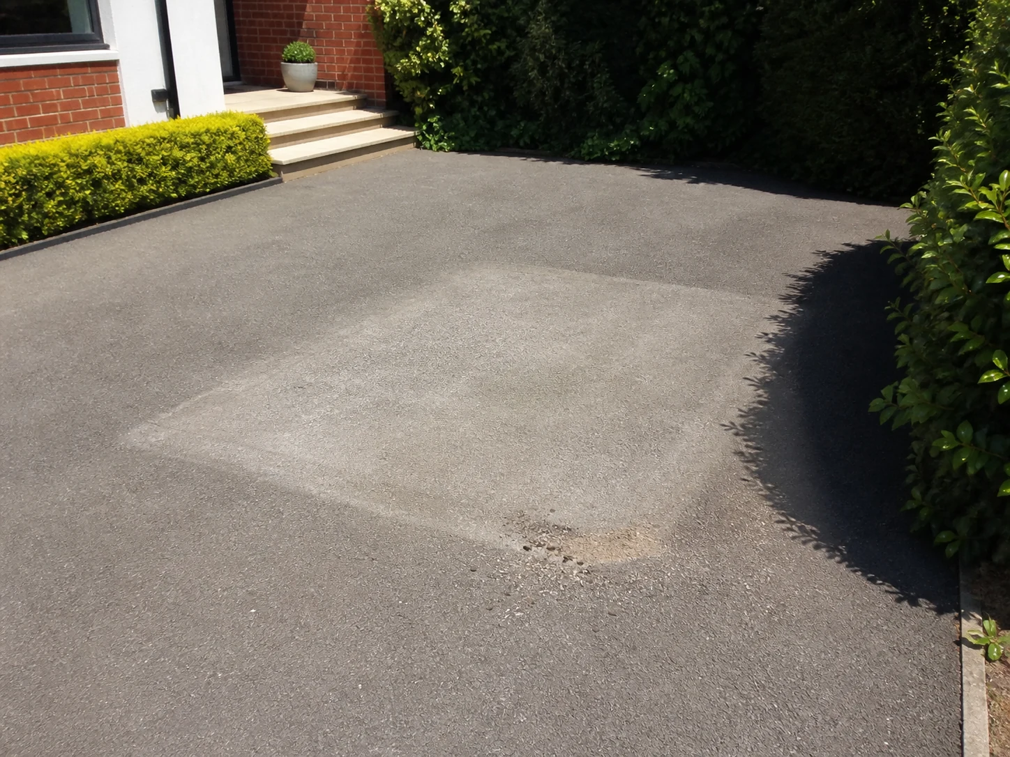 A clean driveway after the skip has been collected